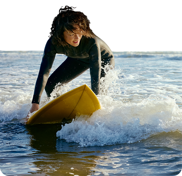 A woman surfing.